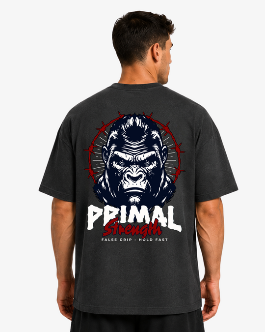 Vista traseira da Oversize T-Shirt Primal Strength da False Grip em DARK GREY com grafismo de gorila e lettering Primal Strength.