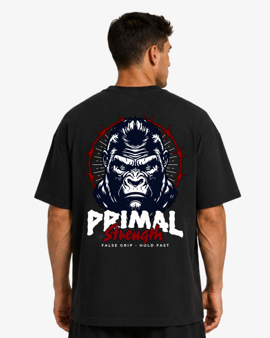 Vista traseira da Oversize T-Shirt Primal Strength da False Grip em Black, com grafismo de gorila e lettering Primal Strength.